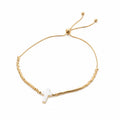 BRACELET MOTHER OF PEARL CROSS ADJUSTABLE