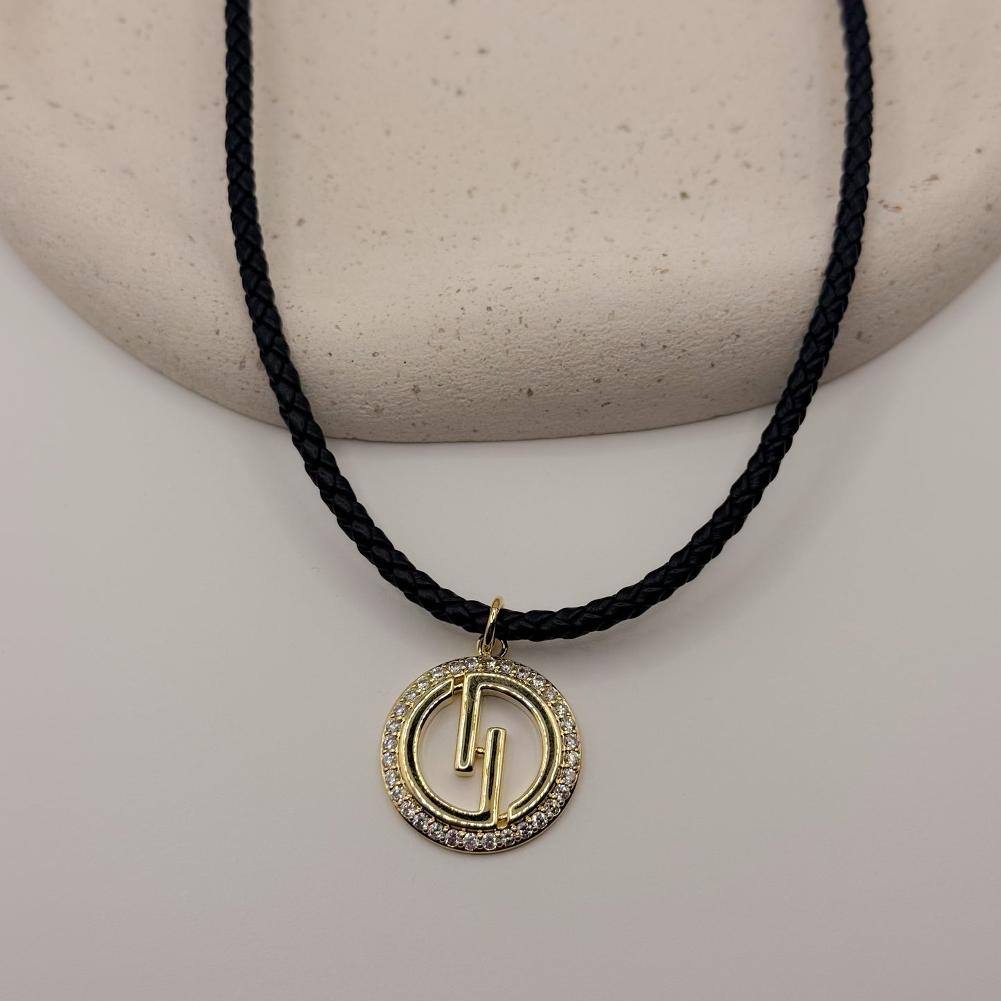 NECKLACE BRAIDED BLACK LEATHER WITH ROUND PENDANT