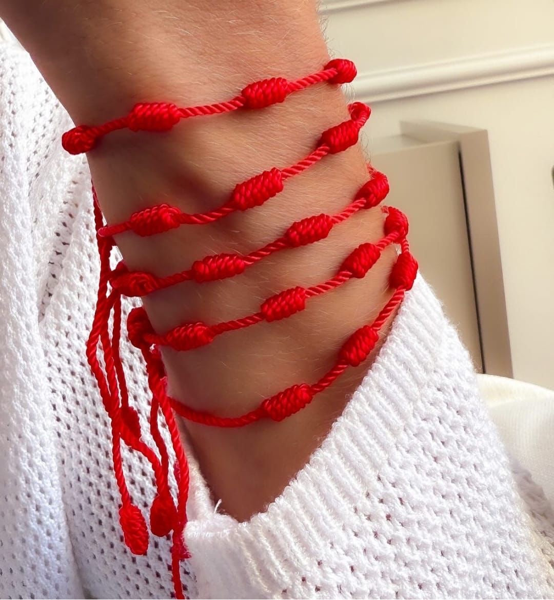 BRACELET RED STRING 7KNOTS
