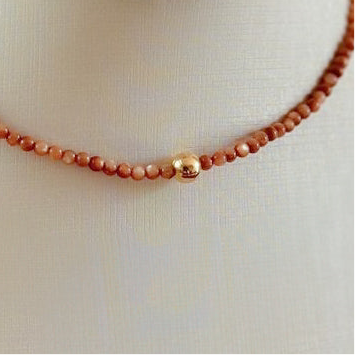 NECKLACE BROWN MOTHER OF PEARL GOLD SPHERE