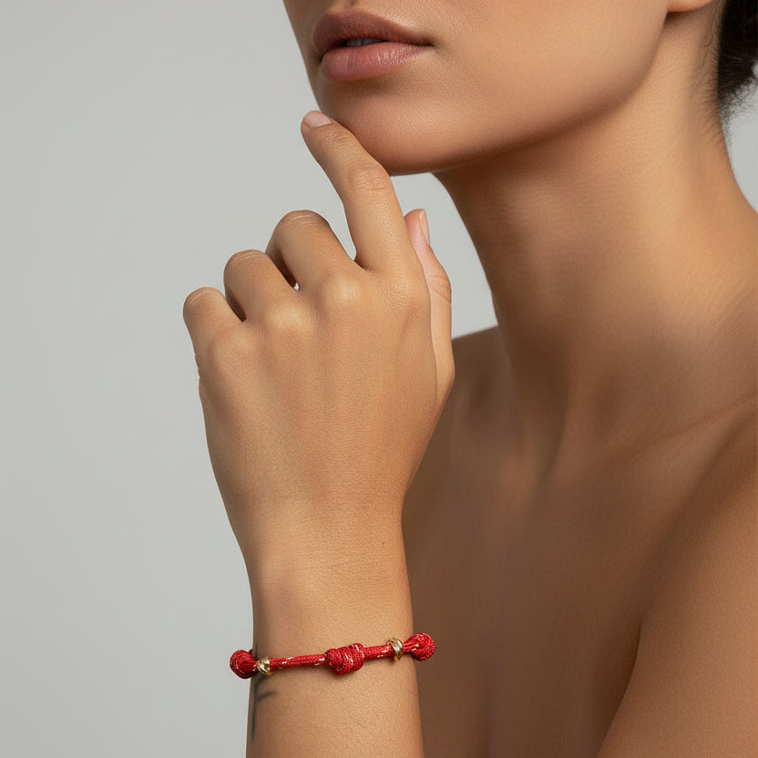 BRACELET RED STRING KNOTS AND GOLDEN RINGS